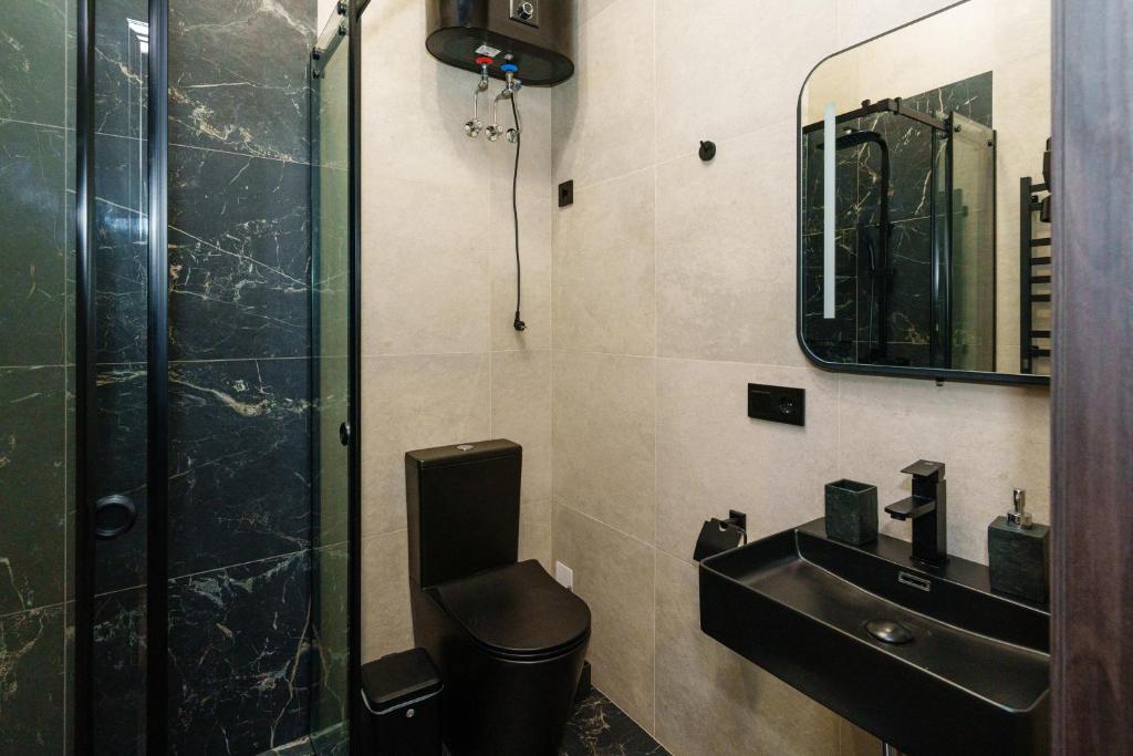 Koupelna v ubytování Palmira Hotel