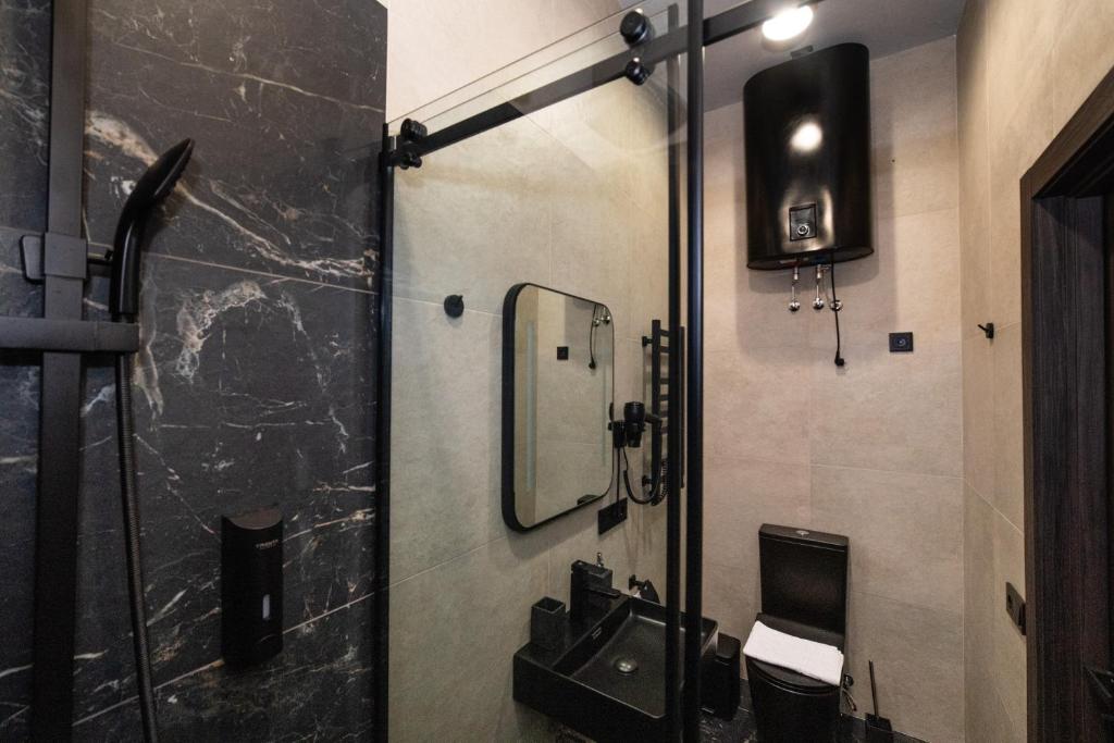 Koupelna v ubytování Palmira Hotel
