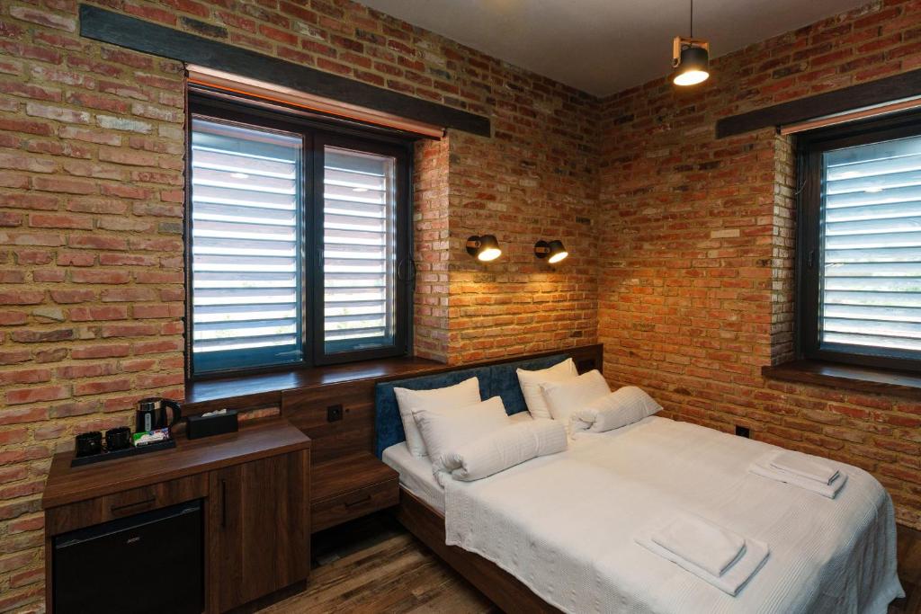 Postel nebo postele na pokoji v ubytování Palmira Hotel