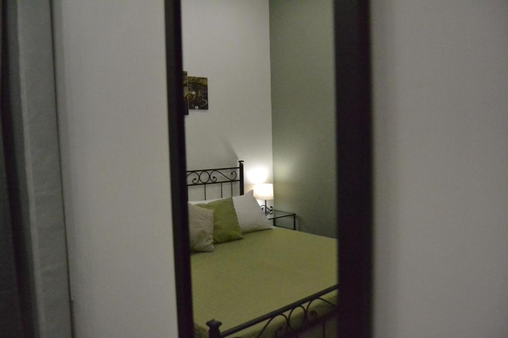 Postel nebo postele na pokoji v ubytování Karina's Rooms