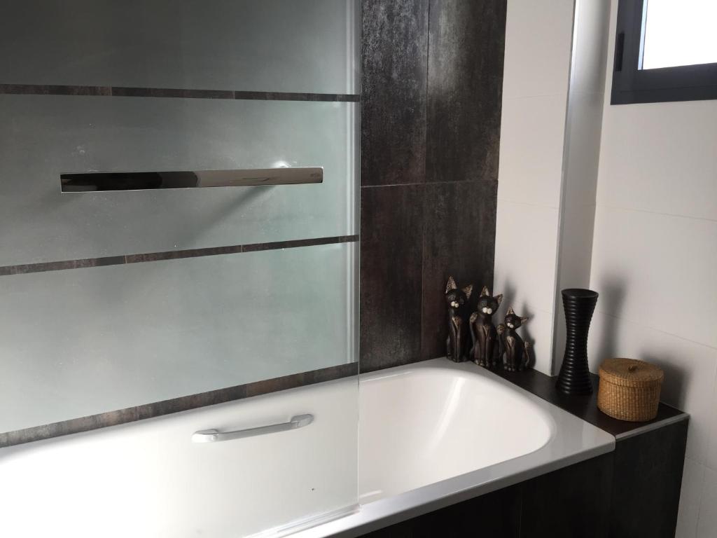 Koupelna v ubytování OasisBeach Penthousse la Zénia