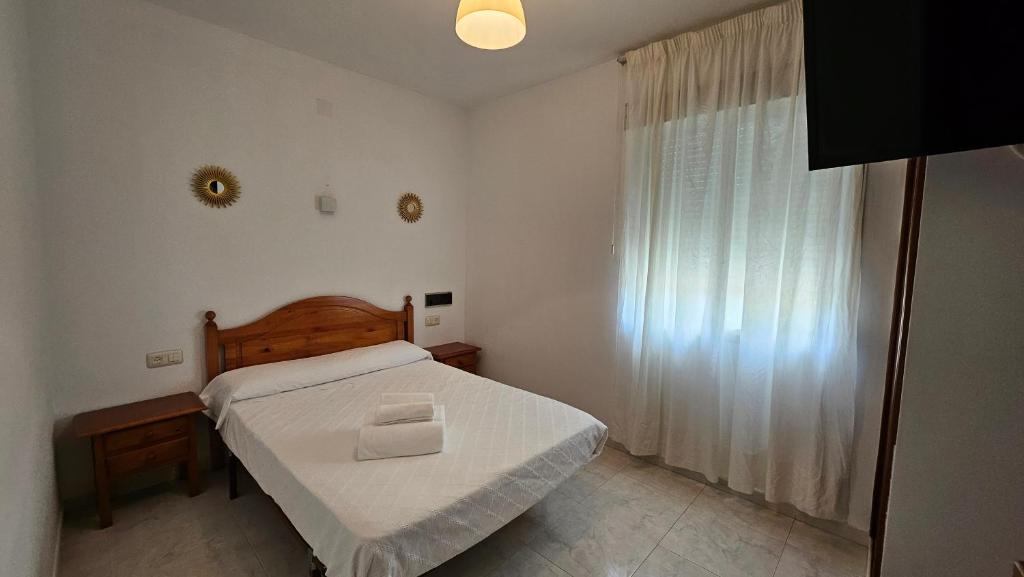 Postel nebo postele na pokoji v ubytování Hotel Nuevo Julios by Olda