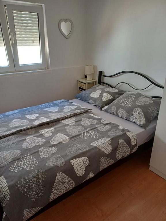 Posteľ alebo postele v izbe v ubytovaní Apartments Jurić - Zablaće