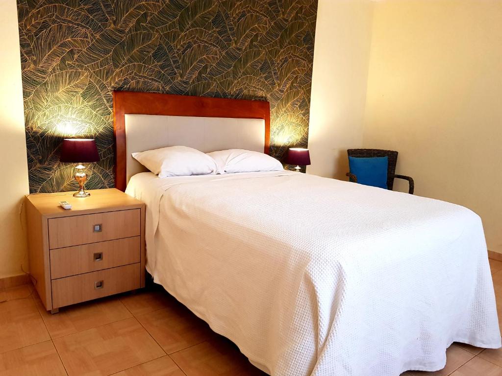 Postel nebo postele na pokoji v ubytování Island House near Curacao International Airport CUR