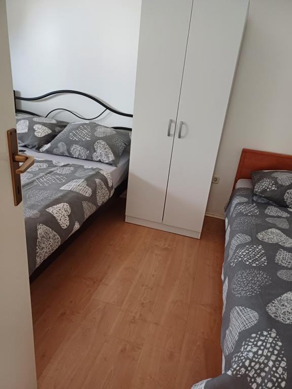 Posteľ alebo postele v izbe v ubytovaní Apartments Jurić - Zablaće