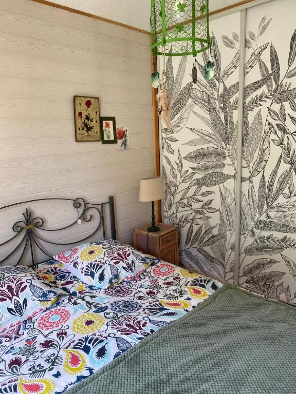 Postel nebo postele na pokoji v ubytování Appartement SérénitE