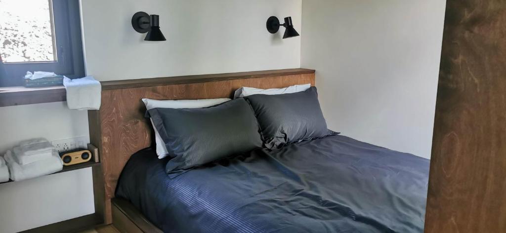 Postel nebo postele na pokoji v ubytování Minimaisons de Val-Jalbert