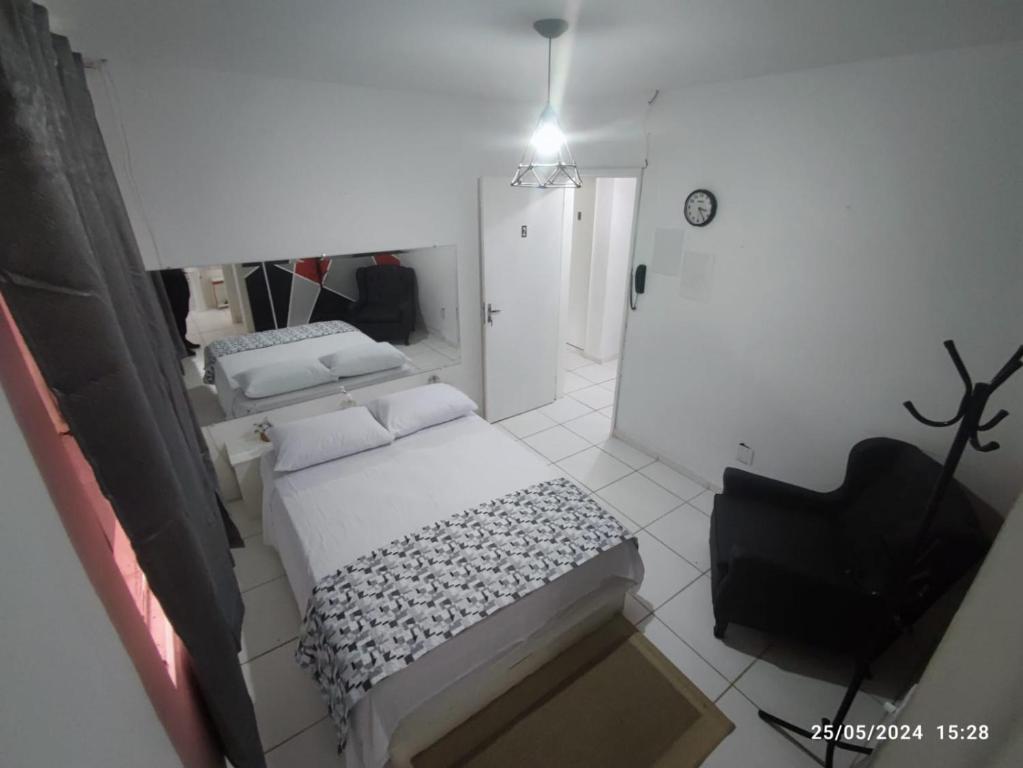 Postel nebo postele na pokoji v ubytování Hostel Pousada Curitiba Budget