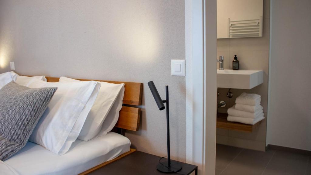 Postel nebo postele na pokoji v ubytování Osteria Bäkar