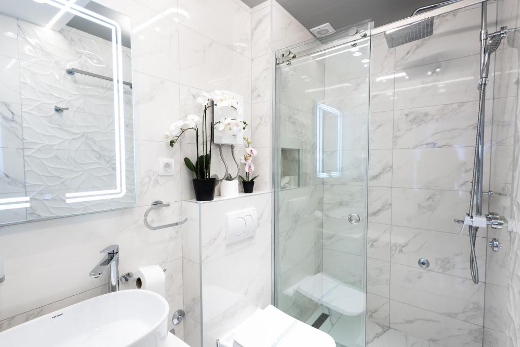 Koupelna v ubytování Garni Hotel Lotos