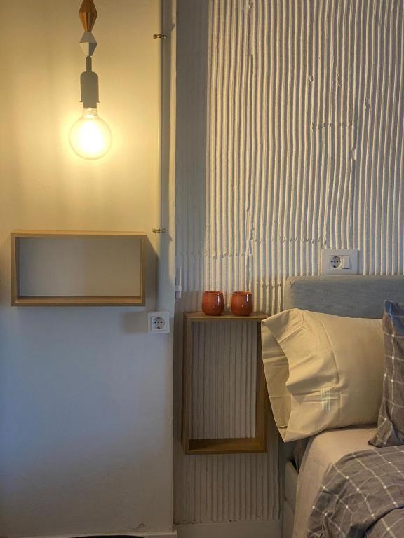 Postel nebo postele na pokoji v ubytování Mirada Do Roxo