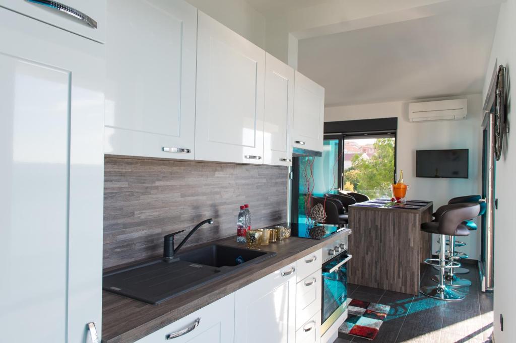 Kuchyň nebo kuchyňský kout v ubytování Design-Beachresort