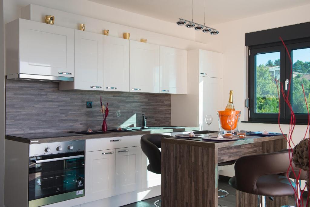 Kuchyň nebo kuchyňský kout v ubytování Design-Beachresort