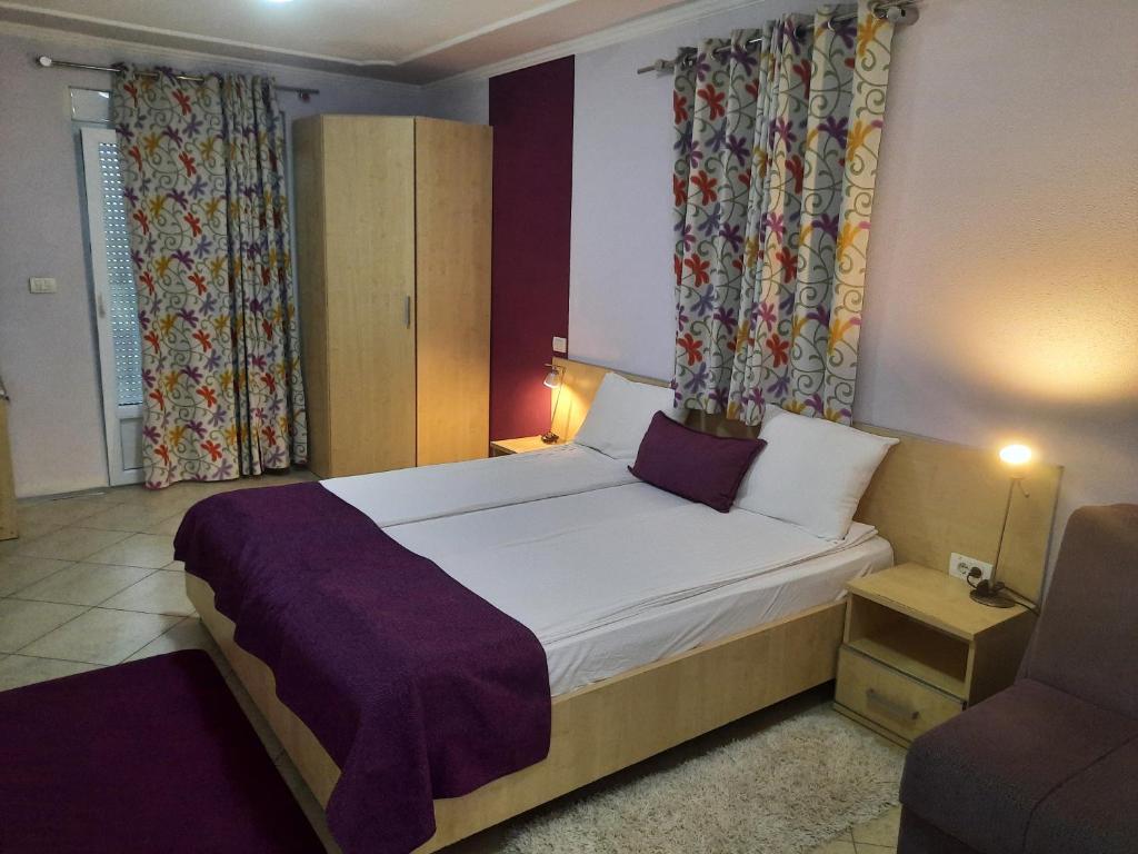 Postel nebo postele na pokoji v ubytování Hotel Aruba