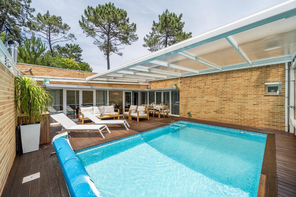 Πισίνα στο ή κοντά στο Moradia Quinta Da Barca - Condomínio de luxo