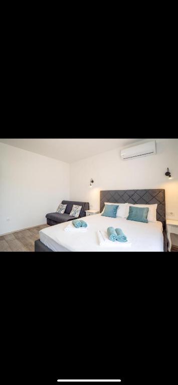 Postel nebo postele na pokoji v ubytování Apartman Jan