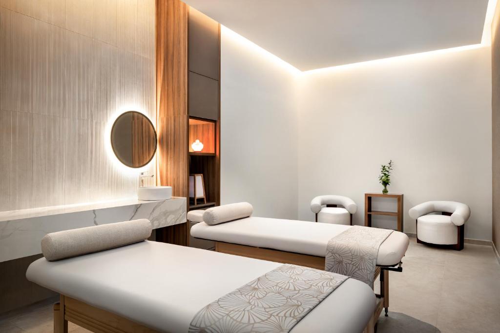 Posezení v ubytování Secrets Tides Punta Cana - All Inclusive