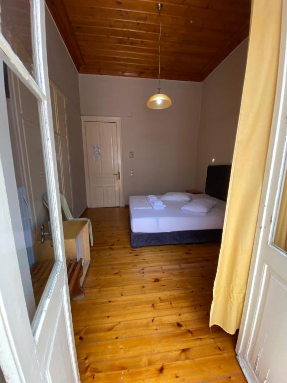 Postel nebo postele na pokoji v ubytování Hotel EPIDAVROS