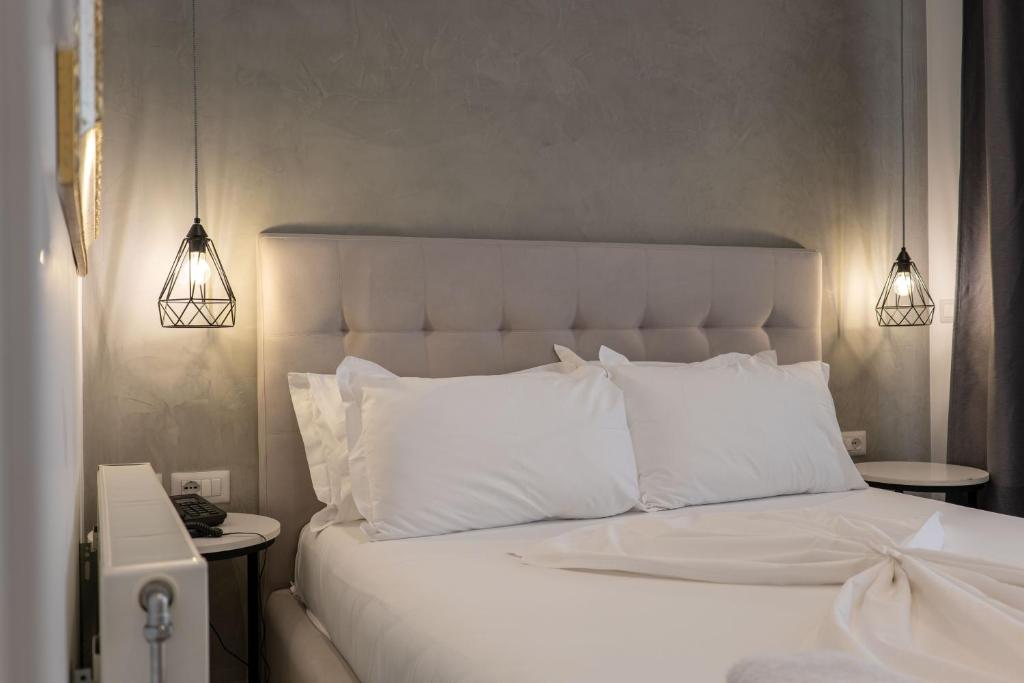Postel nebo postele na pokoji v ubytování Art Hotel