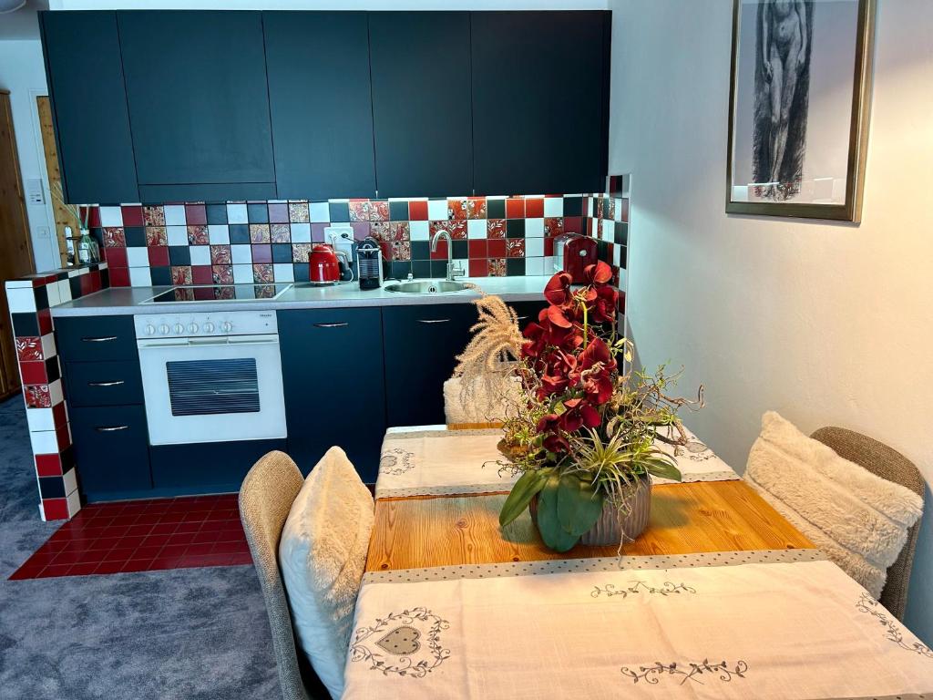 Kuchyň nebo kuchyňský kout v ubytování Alpine Studio Apartment