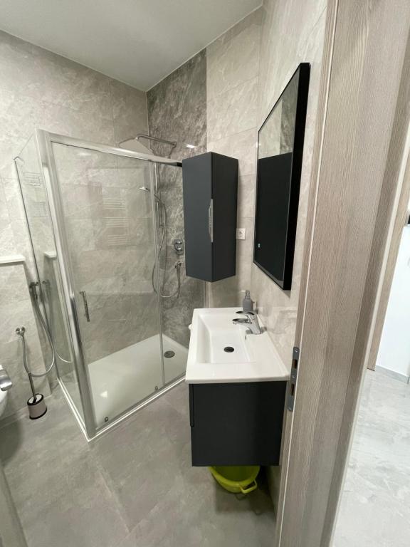 Koupelna v ubytování Apartments Adria