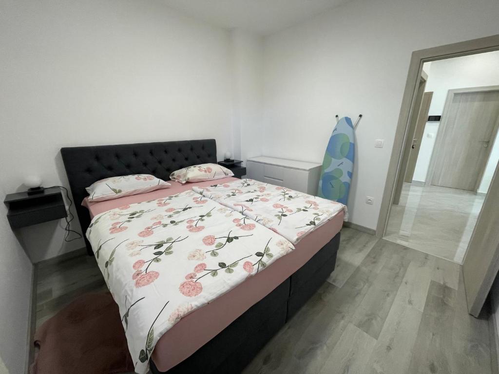 Postel nebo postele na pokoji v ubytování Apartments Adria