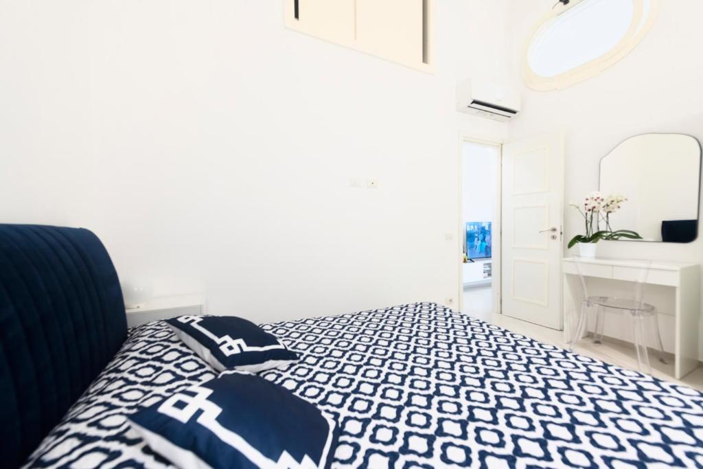 Postel nebo postele na pokoji v ubytování La Rosa di Capri