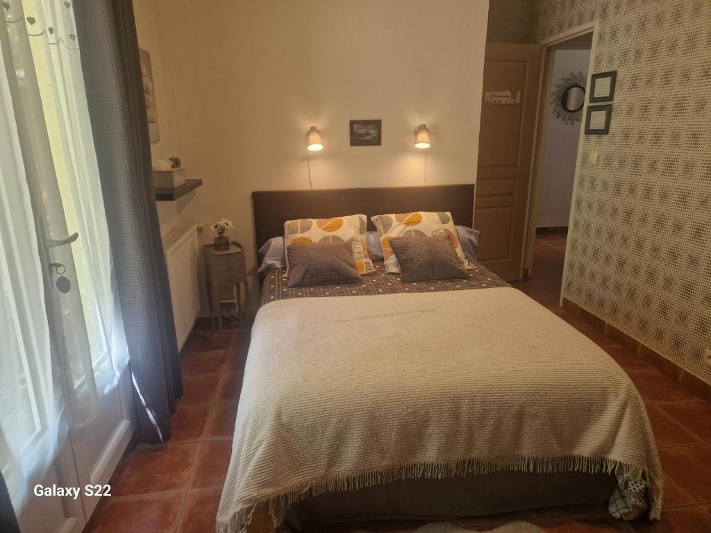 Postel nebo postele na pokoji v ubytování Domaine de Sahil