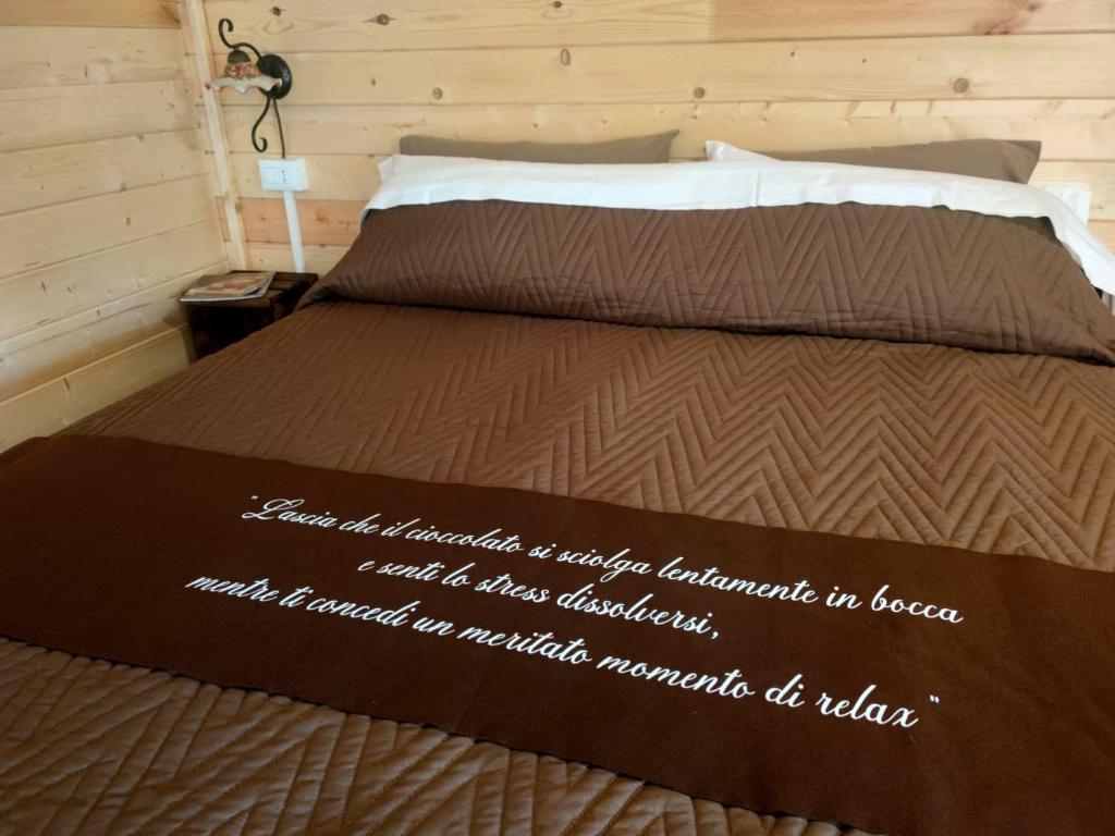 A bed or beds in a room at Choco B&B