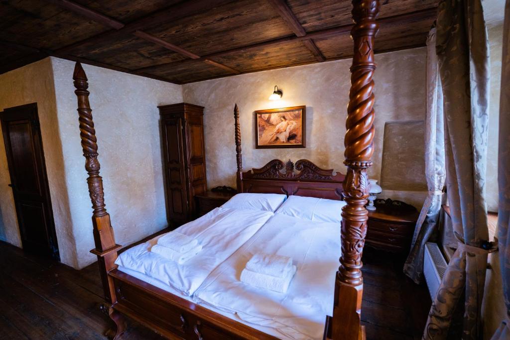 Postel nebo postele na pokoji v ubytování Penzion Baroko