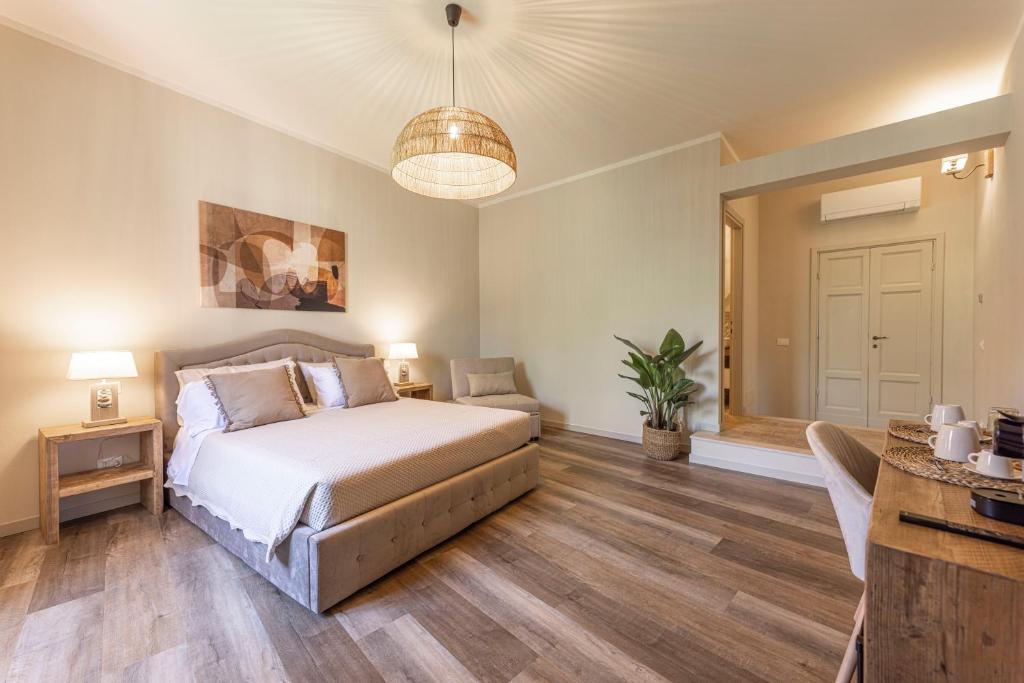 Postel nebo postele na pokoji v ubytování I Due Mondi Rooms