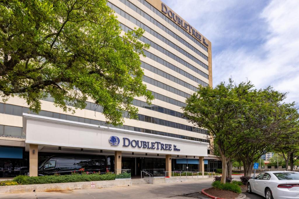 a rendering of the front of a dover office building at DoubleTree by Hilton Houston Medical Center Hotel & Suites in Houston