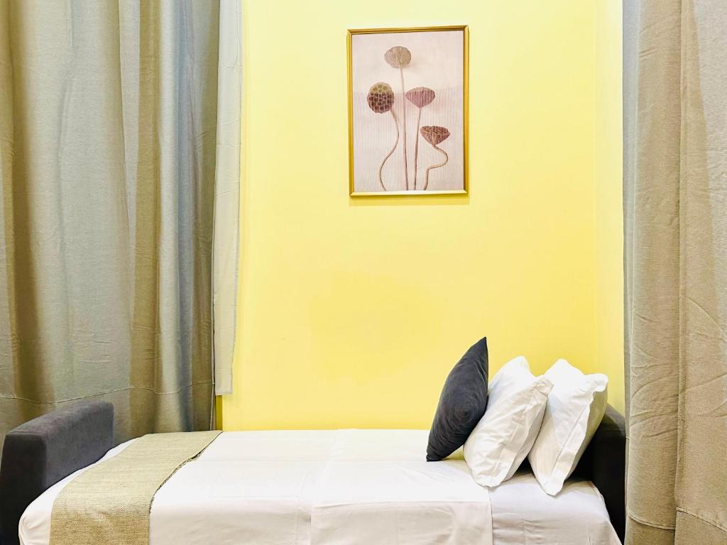 Postel nebo postele na pokoji v ubytování Hotel Rome place