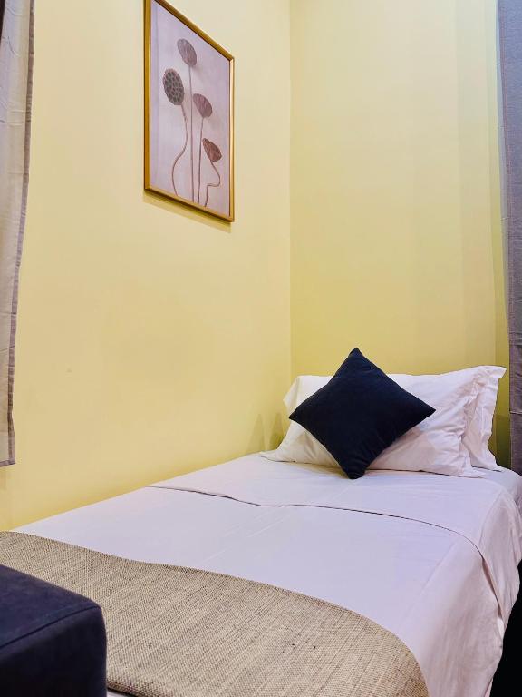 Postel nebo postele na pokoji v ubytování Hotel Rome place
