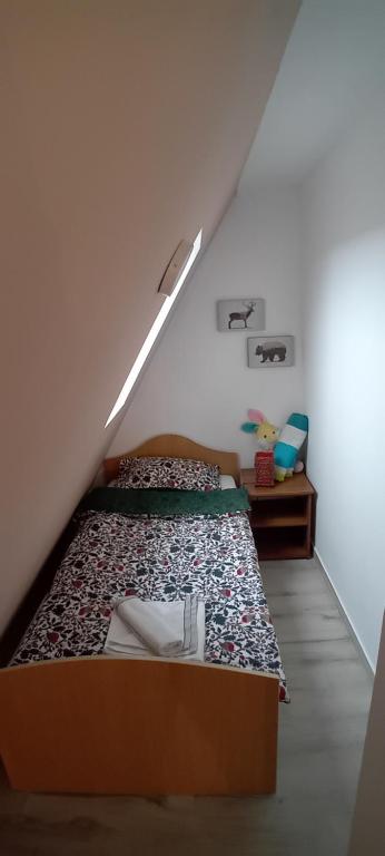 Postel nebo postele na pokoji v ubytování Vila Planinski Mir *Merdzan*