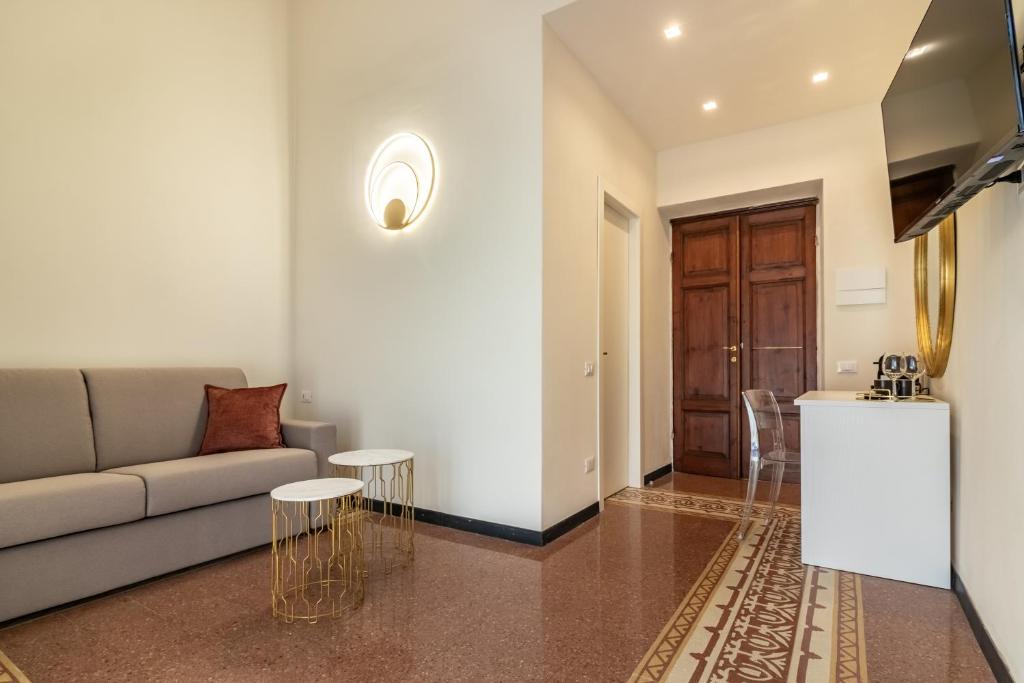 TV a/nebo společenská místnost v ubytování Oldoini Luxury Apartment and Suites