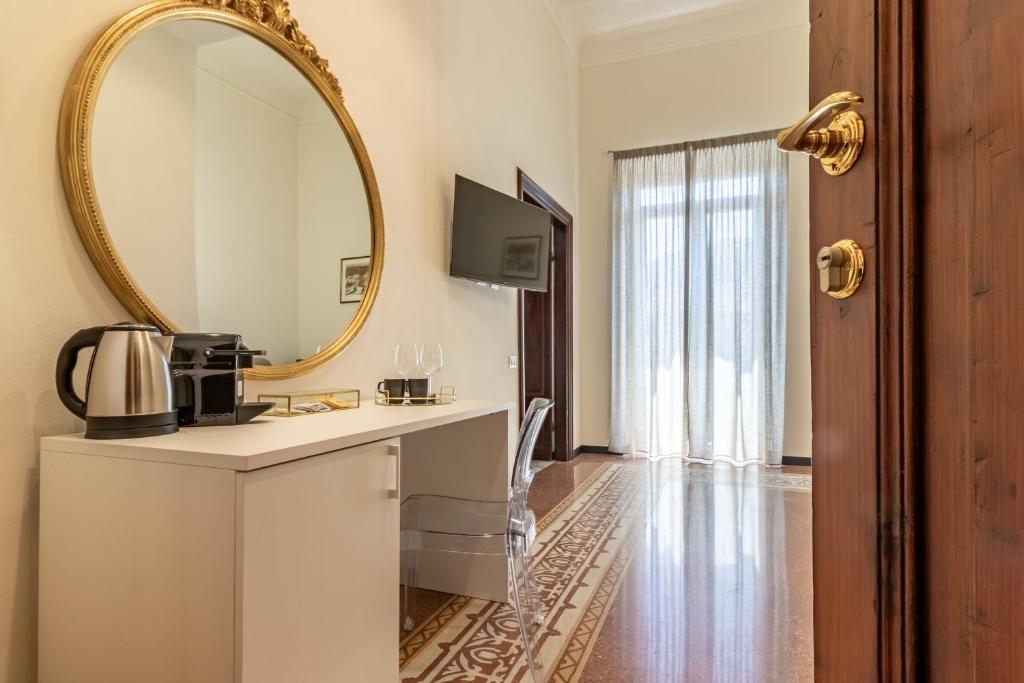 TV a/nebo společenská místnost v ubytování Oldoini Luxury Apartment and Suites