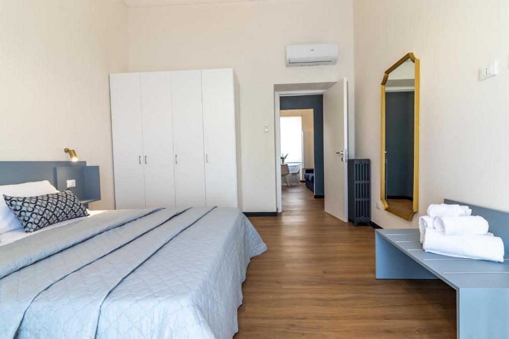 Postel nebo postele na pokoji v ubytování Oldoini Luxury Apartment and Suites