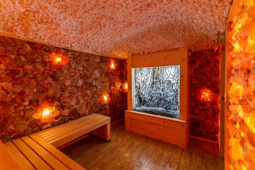 Postel nebo postele na pokoji v ubytování WYDMA Resort Medi & SPA - Normobaria