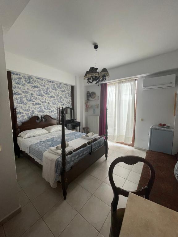 Ένα ή περισσότερα κρεβάτια σε δωμάτιο στο 4lions Studio check -in after 16:00