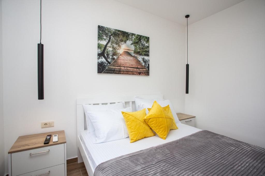 Postel nebo postele na pokoji v ubytování Apartments NIKOS FAMILY