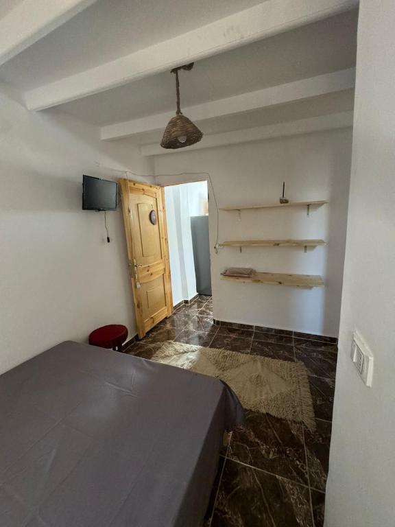 Postel nebo postele na pokoji v ubytování Shahenda House