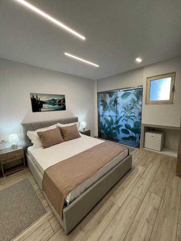 Postel nebo postele na pokoji v ubytování Coral Home