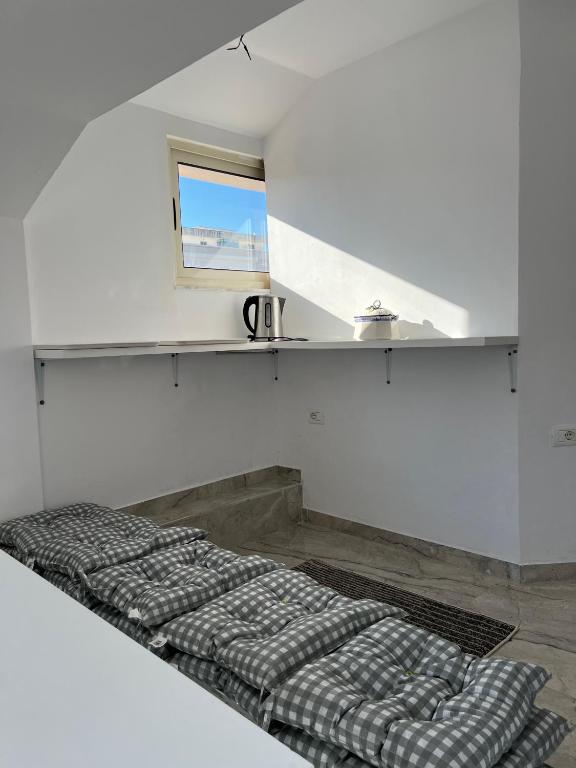 Postel nebo postele na pokoji v ubytování Coral Home