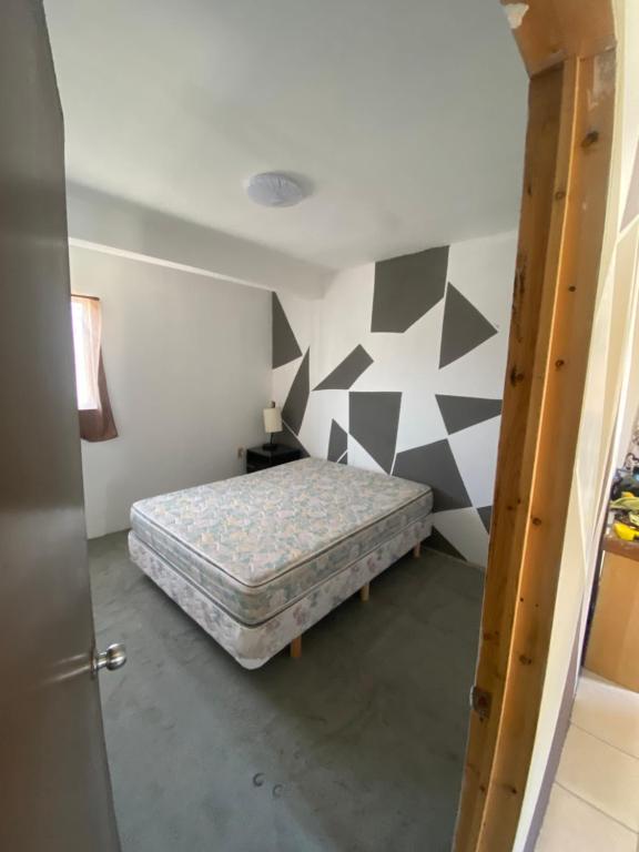Ένα ή περισσότερα κρεβάτια σε δωμάτιο στο Casa chica