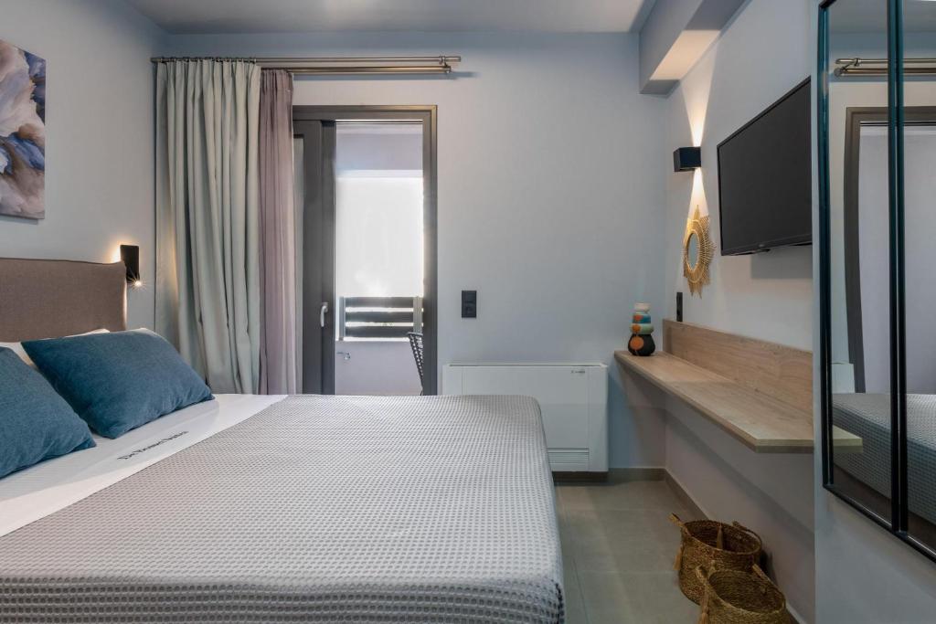 Posteľ alebo postele v izbe v ubytovaní De Bosset Suites Kefalonia