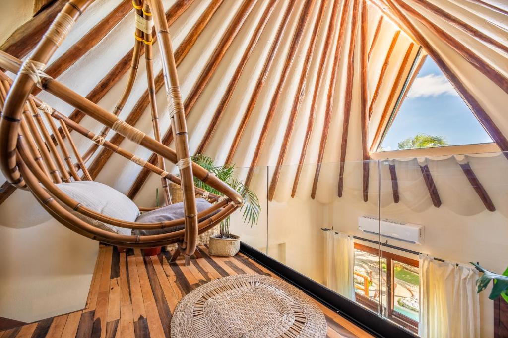 Гостиная зона в Mezzanine Tulum, a Small Luxury Hotel