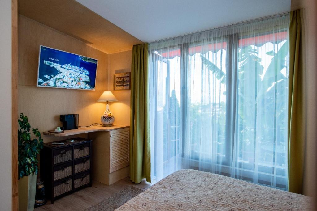 TV a/nebo společenská místnost v ubytování Belvedere