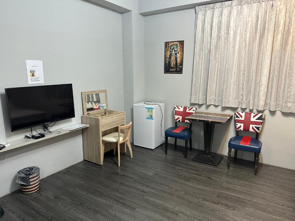 TV a/nebo společenská místnost v ubytování 丹藍民宿