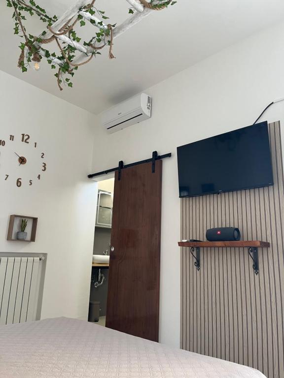 TV a/nebo společenská místnost v ubytování B&B Antiche Mura